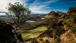 Harmonize with sacred energy while hiking The Quiraing on the Isle of Skye.
